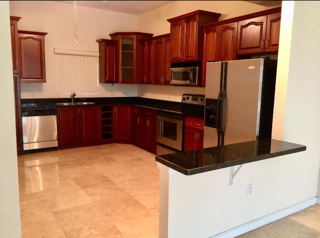 Photo of 1610 Presidential Way #B-305, West Palm Beach, FL 33401 (MLS # B26027702)