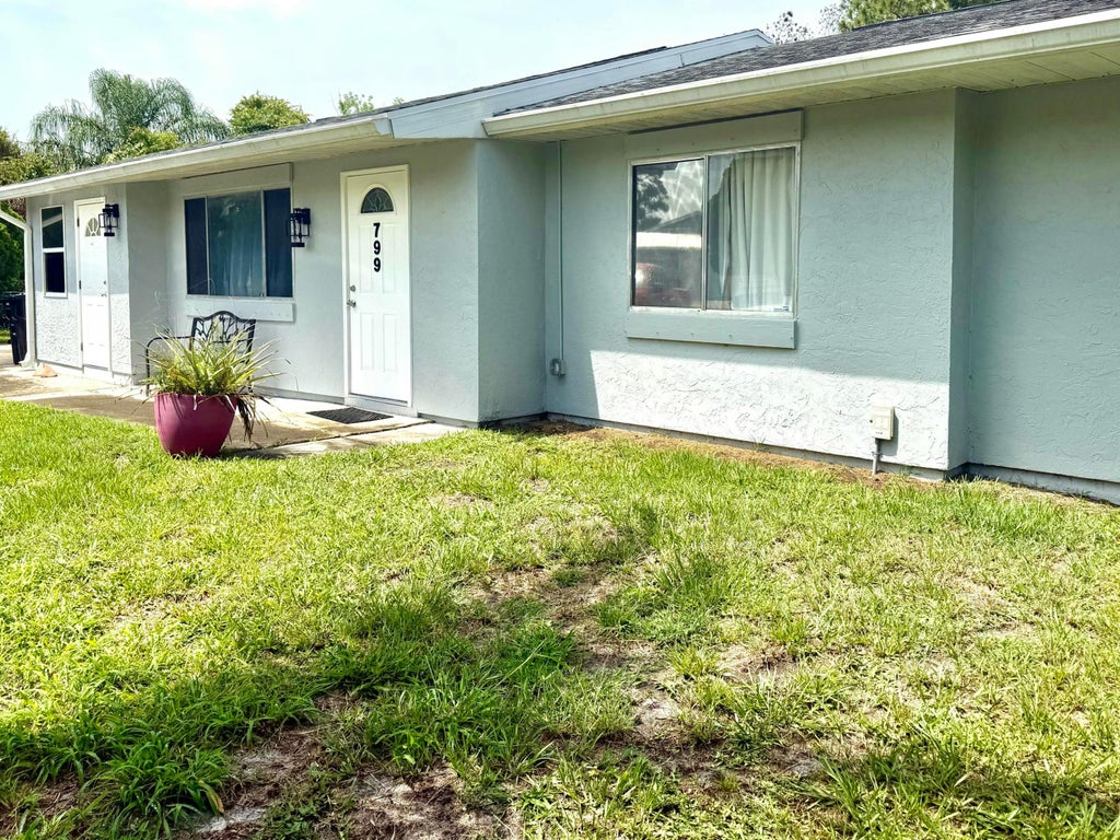 Photo of 799 NW Jorgensen Road, Port Saint Lucie, FL 34983 (MLS # B26036457)