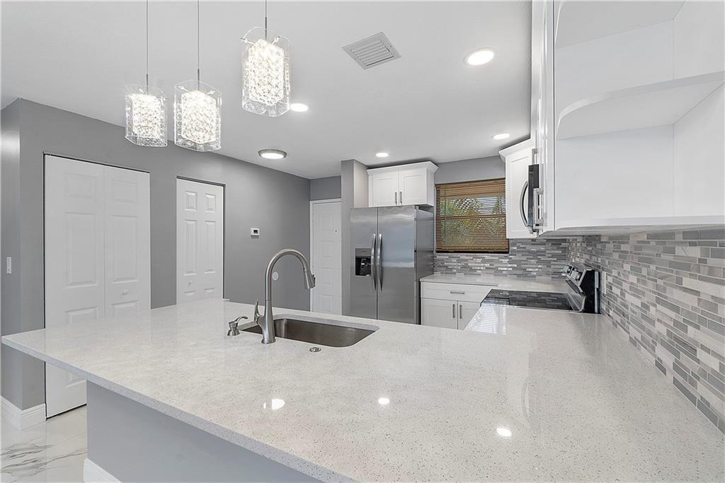 11477 NW 39th Court 305-1