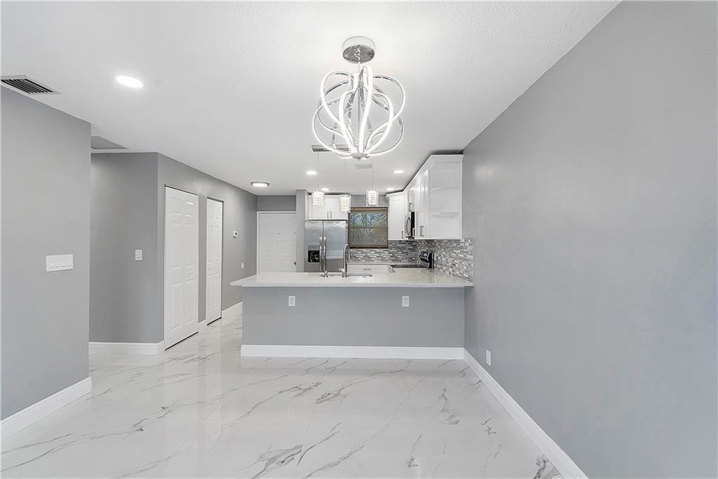 11477 NW 39th Court 305-1