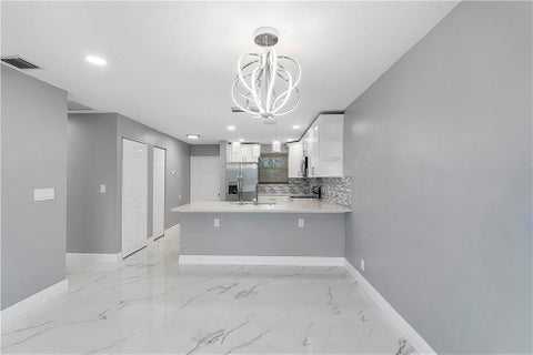 Tiny photo for 11477 NW 39th Court #305-1, Coral Springs, FL 33065 (MLS # B26058954)