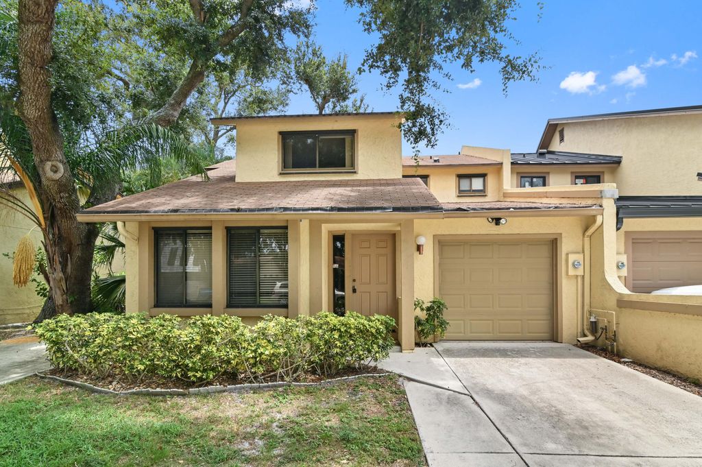 Photo of 1019 Raintree Drive, Palm Beach Gardens, FL 33410 (MLS # R11003504)