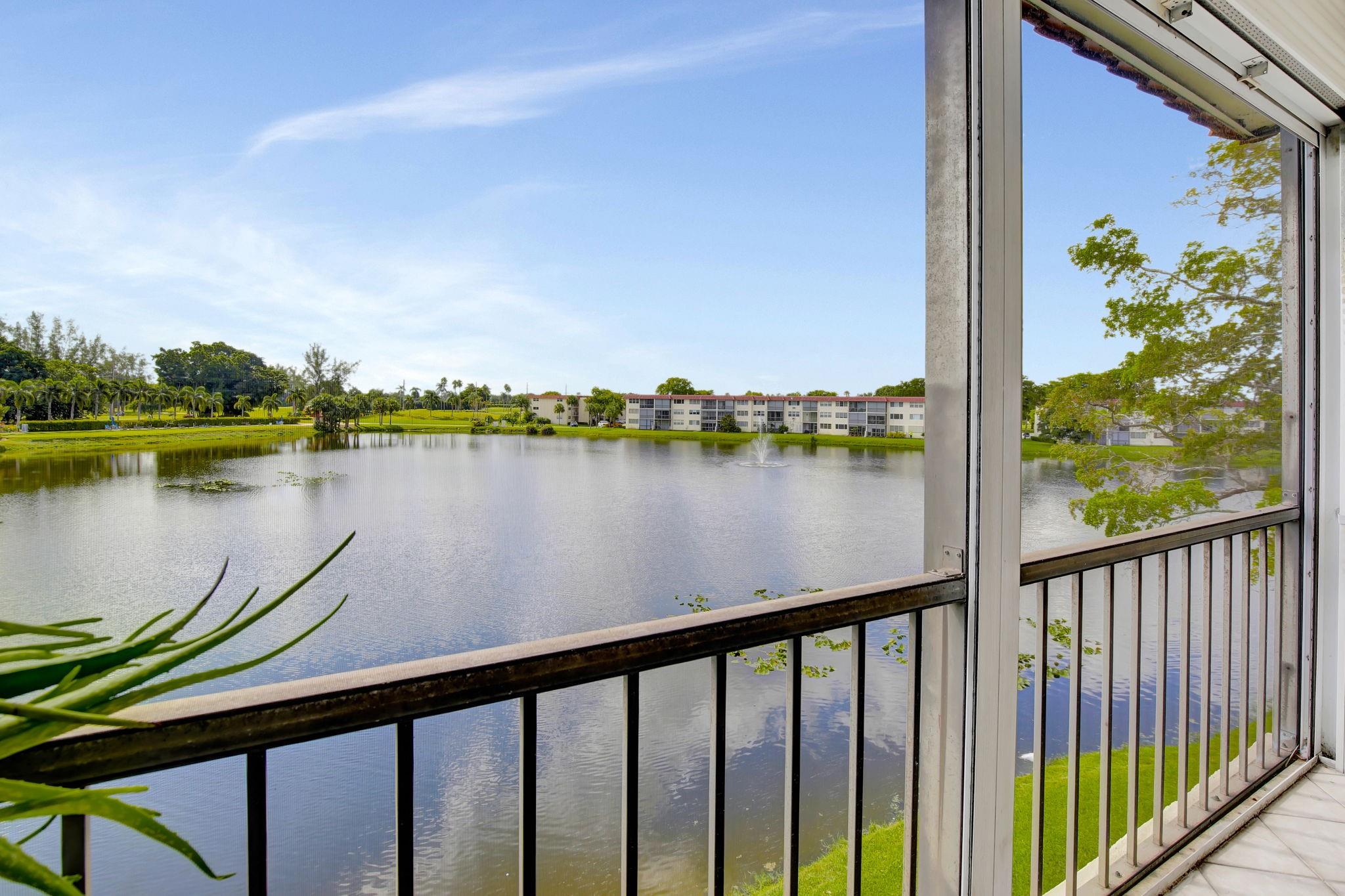 Rare Full Two Bedroom Corner With Direct Large Lake And PGA Golf Course Views-Kitchen Has Been Updated With Cabinets, Granite Counter Tops and Appliances-All Tiled Flooring-Master Bedroom On The Lake Has Upgraded
Windows-Has Paid Up Rec Lease-Can Walk To Pool and All Amenities-May Have Small Pet to 20 Lbs.-
Free golf, 14 tennis courts, 7 pools, theater, fitness center, restaurant, 24-hour security, Assoc. represents housing for older persons authorized (HOPA).. *** IMPORTANT! See Broker Remarks below for occupancy qualifications.