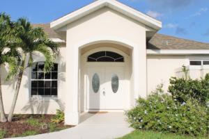 Large and Clean home on a corner lot. 3 Bedroom 2.5 Bath over-sized 2 Car Garage, close to Saint Lucie West. Recently painted and cleaned ready to be occupied.