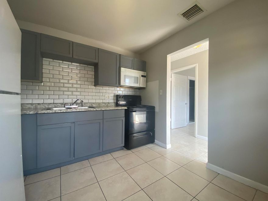 Your New Home Just Got More Affordable! -- Enjoy half off your first month at move-in. Modern, Spacious, and Move-In Ready! - 3-Bed in Fort Pierce Near Downtown & Beach. Simple Living & Great Value: - Brand New Refrigerator (on order) - Flat fee water utility: $100/month - Convenient parking: Up to two vehicles per unit - Fast application process: $125 application fee with quick approval - Security Deposit Alternative Available: Save on move-in costs with our deposit-free option through Obligo!