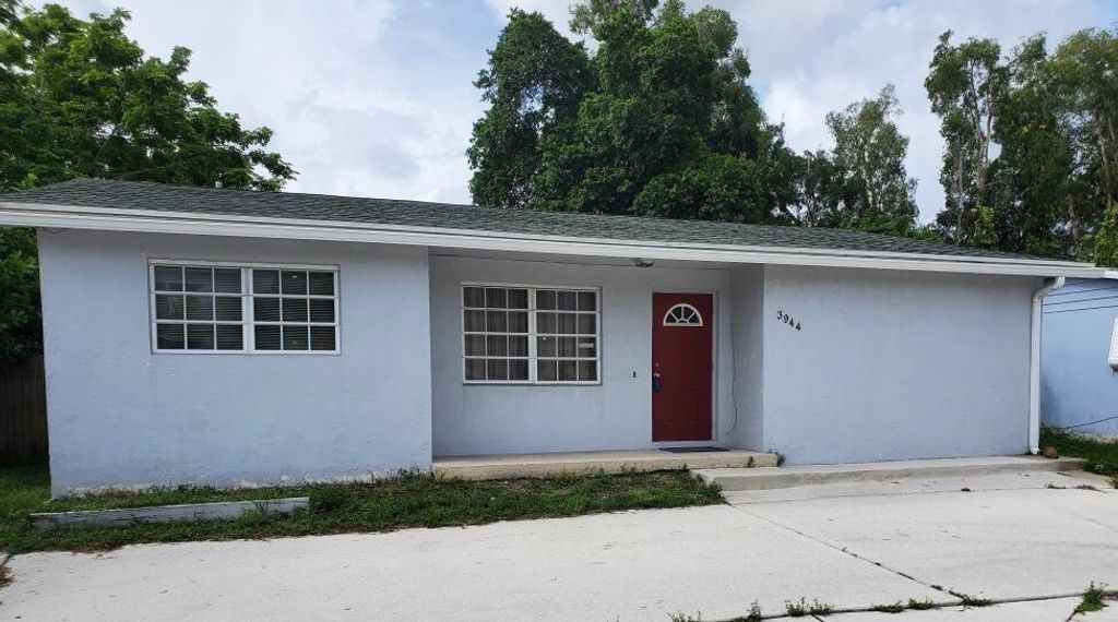 Photo of 3944 Melaleuca Lane, Lake Worth, FL 33461 (MLS # R11020250)