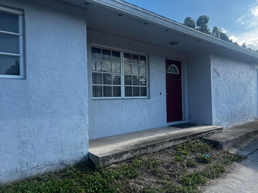 Photo of 3944 Melaleuca Lane, Lake Worth, FL 33461 (MLS # R11020250)