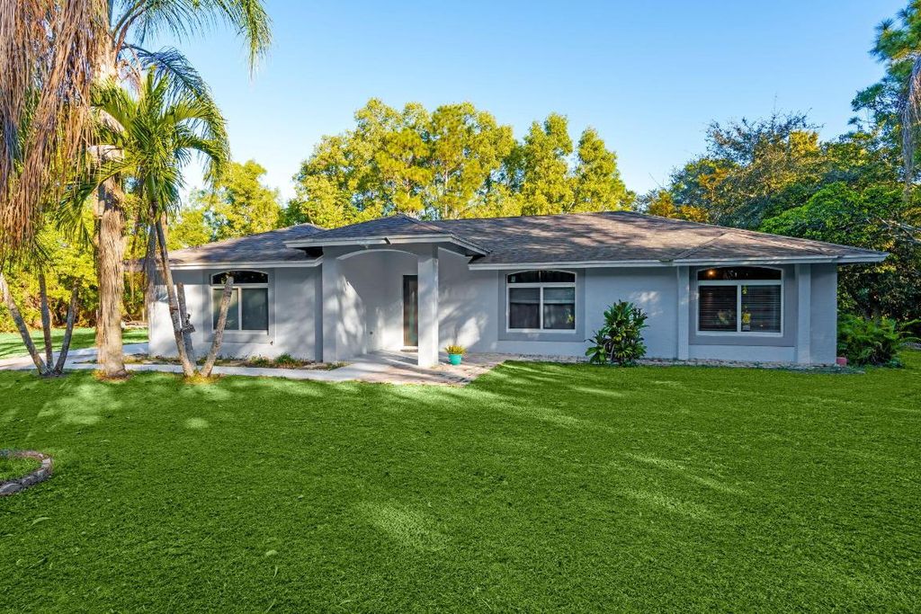 Photo of 14695 97th Road N, West Palm Beach, FL 33412 (MLS # R11156889)