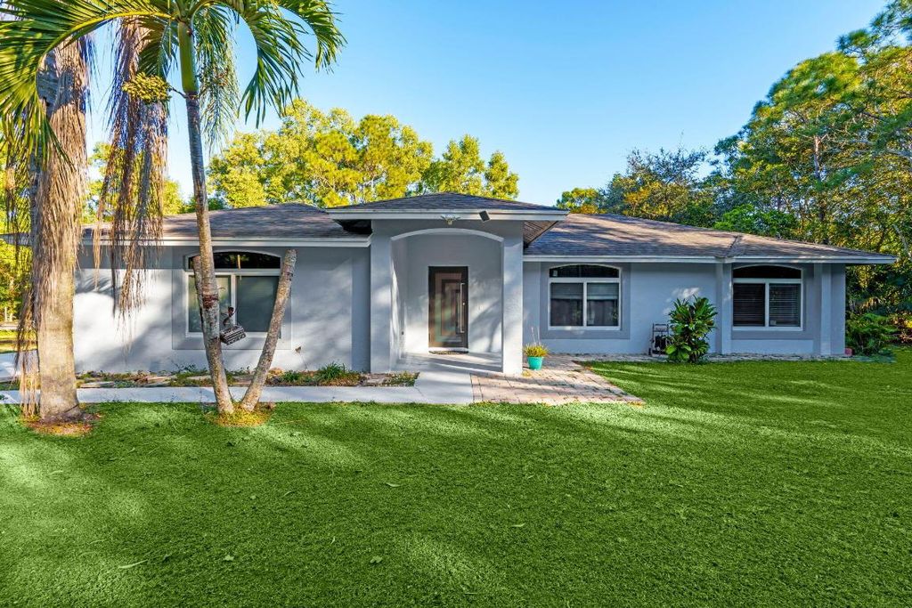 Photo of 14695 97th Road N, West Palm Beach, FL 33412 (MLS # R11156889)