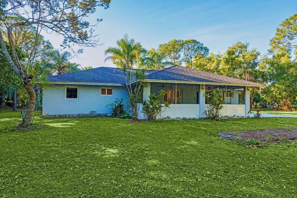 Photo of 14695 97th Road N, West Palm Beach, FL 33412 (MLS # R11156889)