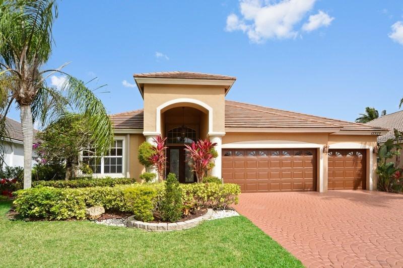 RENT this beautiful HOME and enjoy the easy flow of this split floorplan single story 4 bed/3 bath home w/updated bathrooms. Features newer light fixtures, fans, shades, newer floors, No Carpet, accordion hurricane shutters, 2 car garage with 3rd garage converted into a bonus room, separate laundry room with sink, screen enclosed patio. Truly immaculate and move-in ready, with lake views in the fantastic gated community of Boca Falls with clubhouse including pool, tennis, fitness center. Walk to the A+ Elementary School. Fantastic opportunity to see what Boca Raton has to offer and call this HOME.