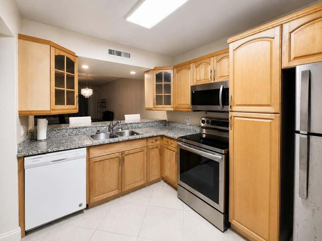 Photo of 3516 Whitehall Drive #105, West Palm Beach, FL 33401 (MLS # B26041599)