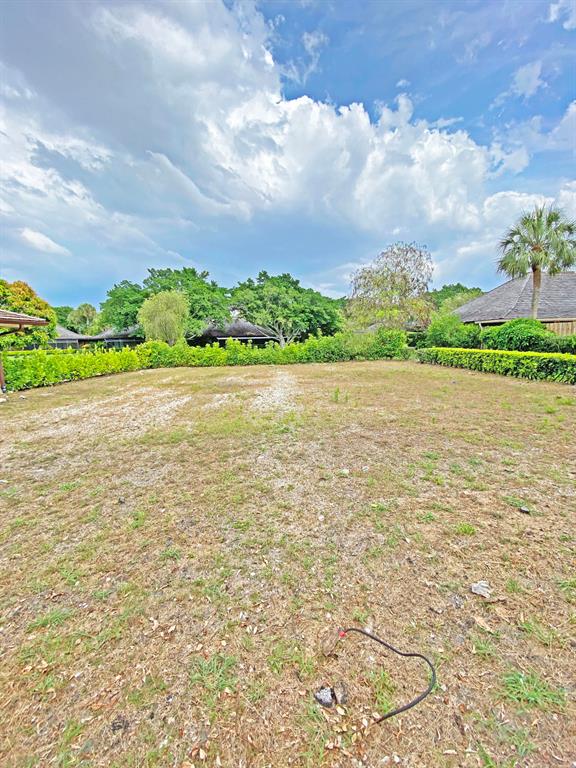 Great lot in beautiful Wellington Golf & Tennis Village Palm Beach Polo and Country Club. The house burned down a few years ago. Buyer will have to reconstruct the same style that it was previously. The house was 1,344 sq. ft, 3 beds and 2 baths. The HOA carries the primary property insurance for the property and is holding some insurance proceeds. Please see disclosure for more information.All offers needs to go through auction.com