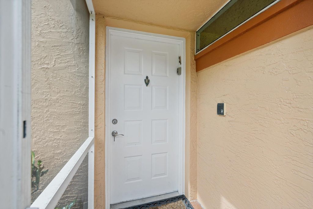 Photo of 7825 Whispering Palms Drive #202, Boynton Beach, FL 33437 (MLS # R11105806)