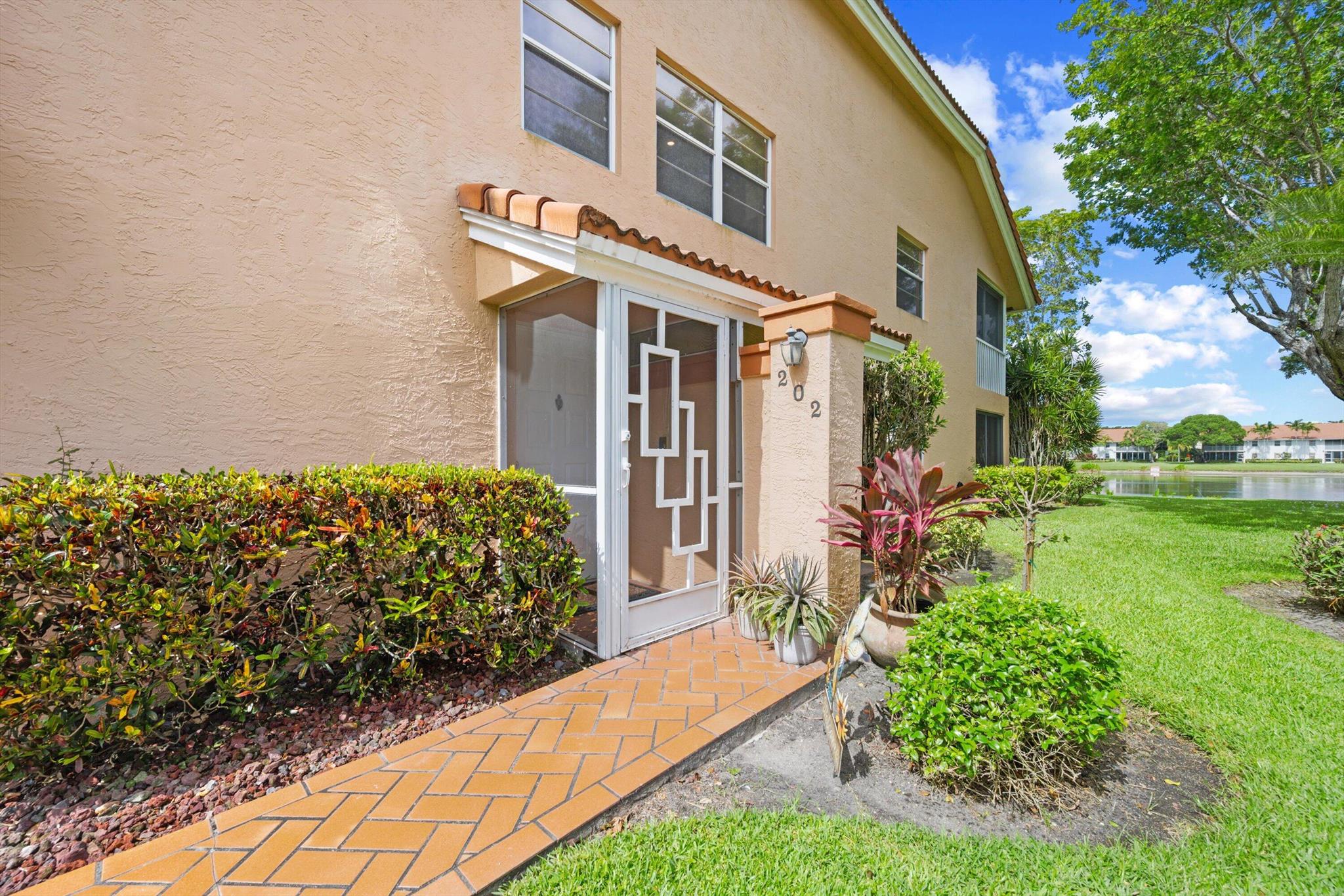 7825 Whispering Palms Drive 202, Boynton Beach, FL, 33437/$410,000 1 7825 Whispering Palms Drive 202