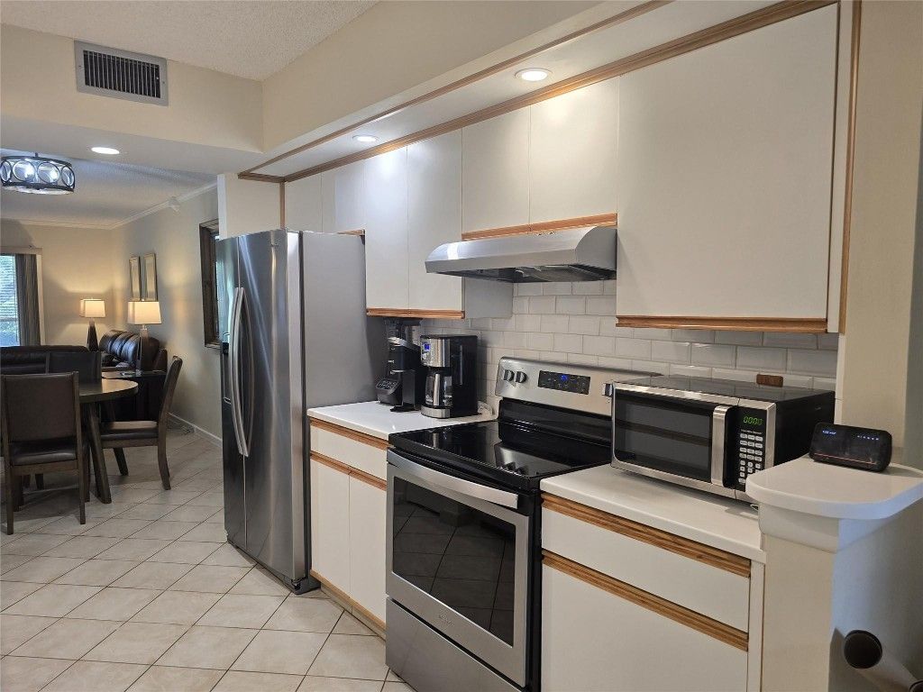 Photo of 1606 Abaco Drive #E1, Coconut Creek, FL 33066 (MLS # F10535895)