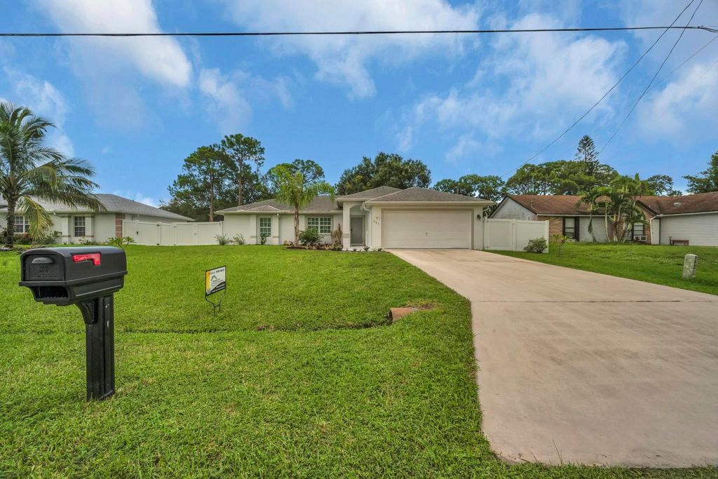 Photo of 551 NW Grenada Street, Port Saint Lucie, FL 34983 (MLS # R11133920)