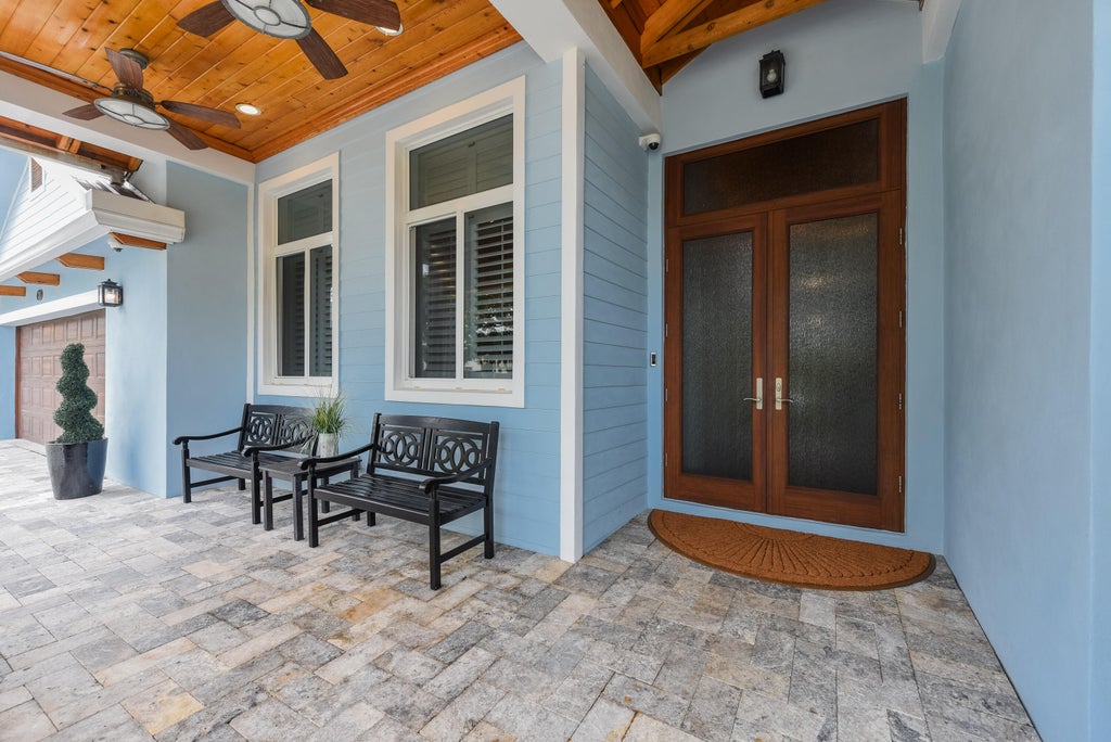 Photo of 730 CAMINO LAKES Circle, Boca Raton, FL 33486 (MLS # B26077920)