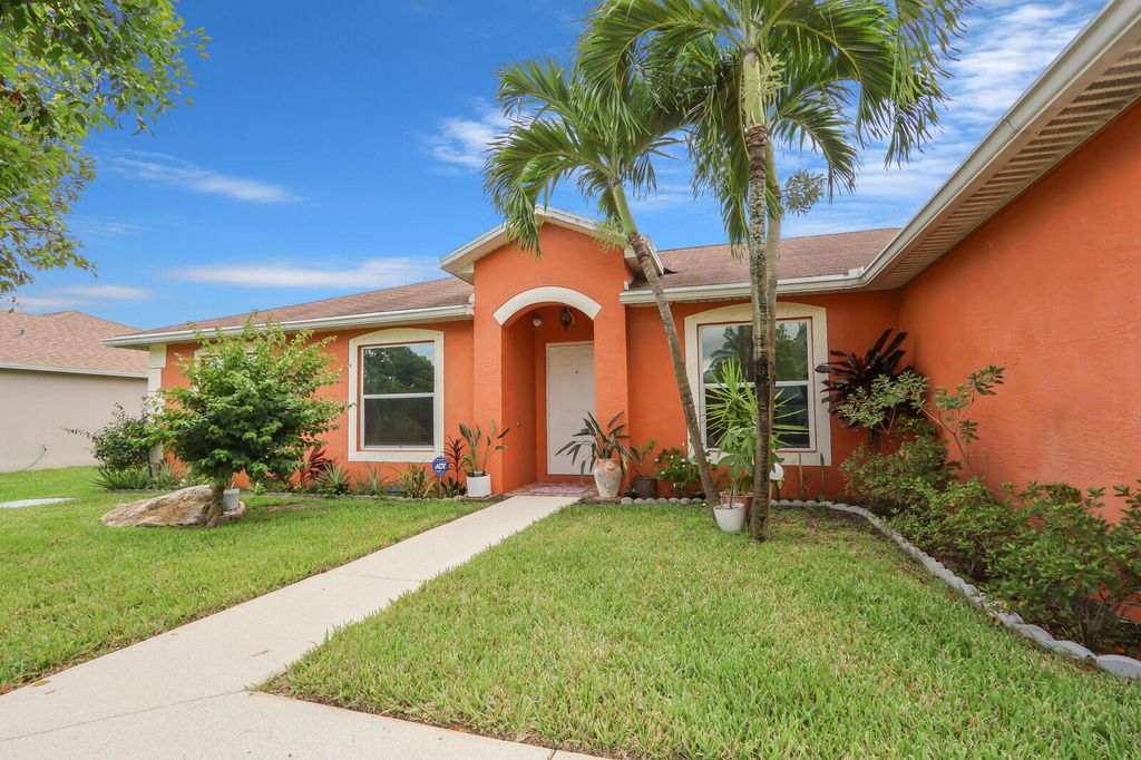 Photo of 1298 SW Patricia Avenue, Port Saint Lucie, FL 34953 (MLS # R11126849)
