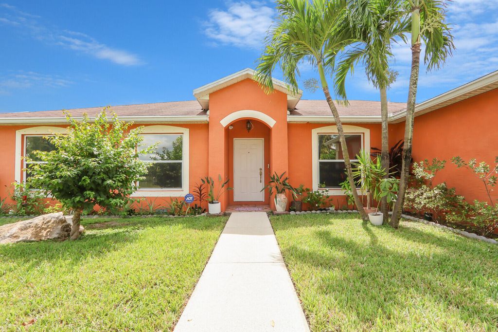 Photo of 1298 SW Patricia Avenue, Port Saint Lucie, FL 34953 (MLS # R11126849)