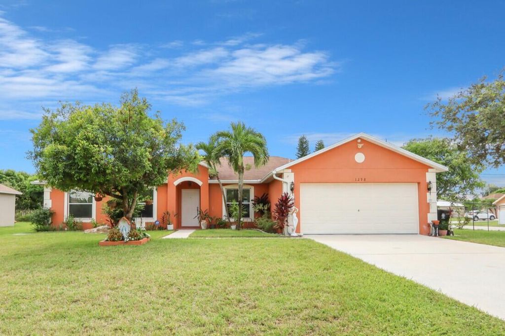 Photo of 1298 SW Patricia Avenue, Port Saint Lucie, FL 34953 (MLS # R11126849)