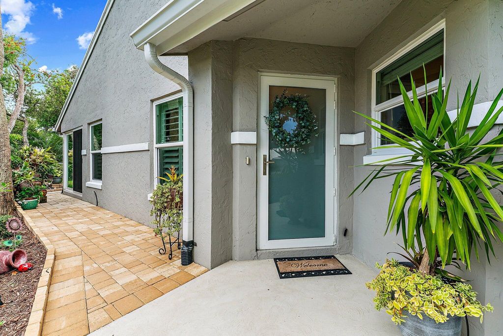 Photo of 2390 SW Foxpoint Way, Palm City, FL 34990 (MLS # R10994796)