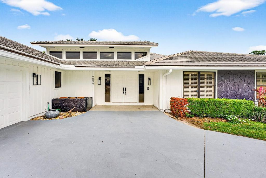 Photo of 6599 Eastpointe Pines Street, Palm Beach Gardens, FL 33418 (MLS # R11155160)