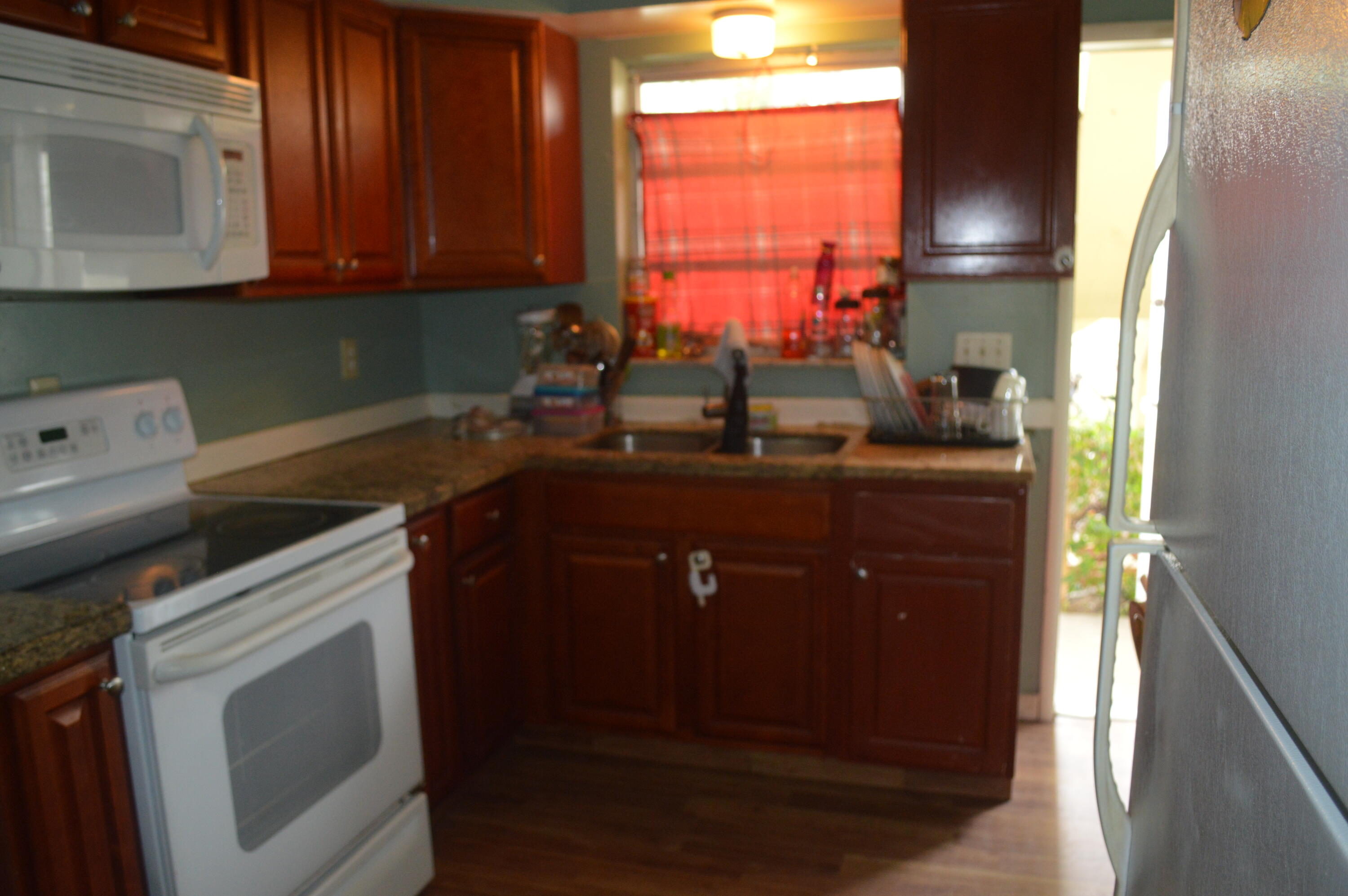 WHISPERING PALMS CONDO - Residential