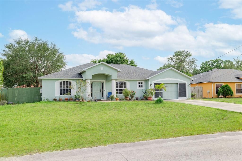 Photo of 1080 SW Dubois Avenue, Port St Lucie, FL 34953 (MLS # R10879973)