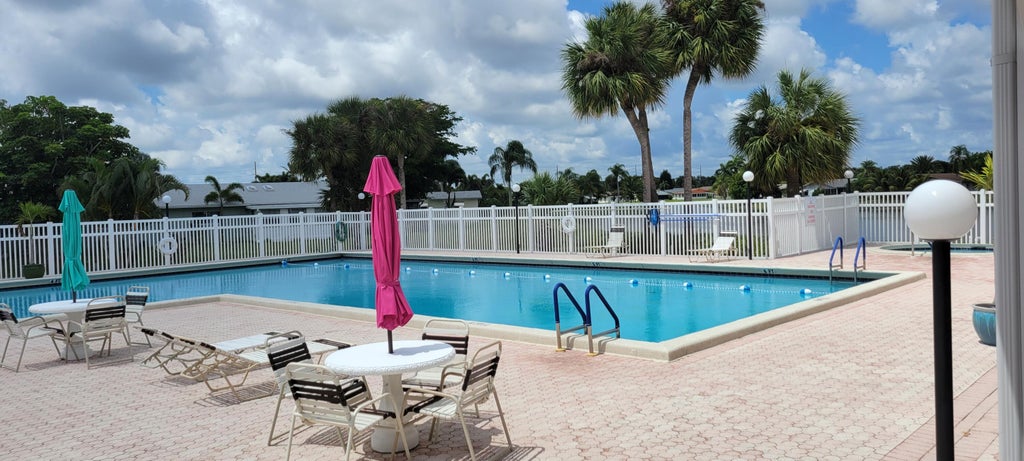 Photo of 13532 WHIPPET Way E, Delray Beach, FL 33484 (MLS # B26088352)