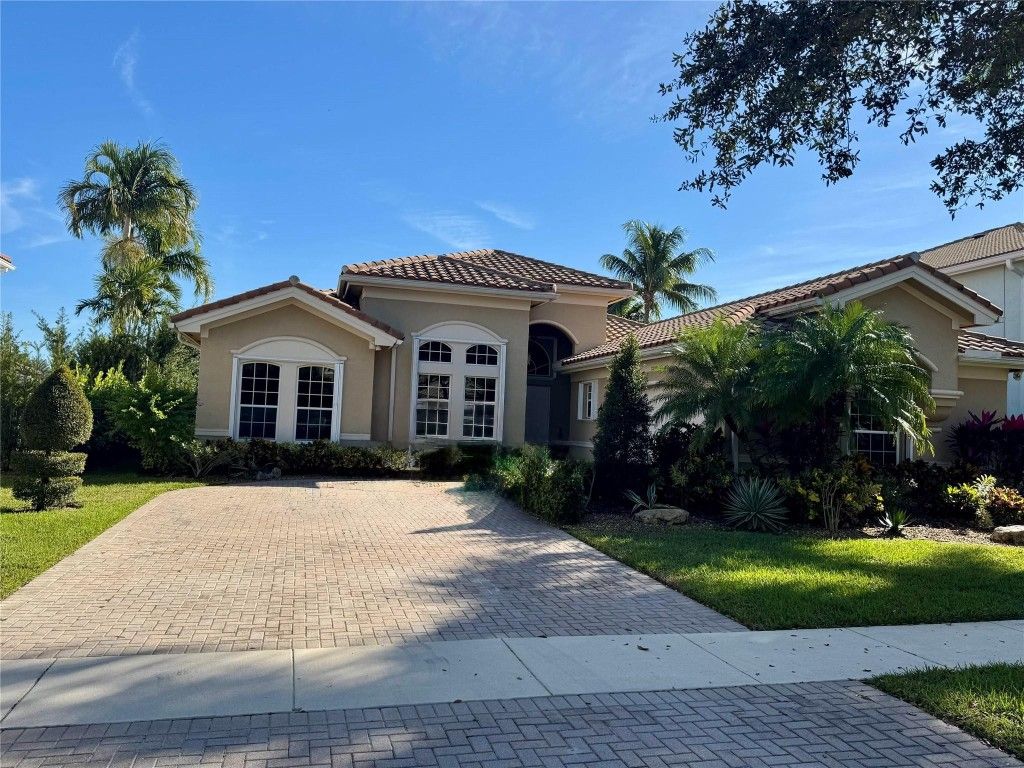 Photo of 11808 Foxbriar Lake Trail, Boynton Beach, FL 33473 (MLS # F10542619)