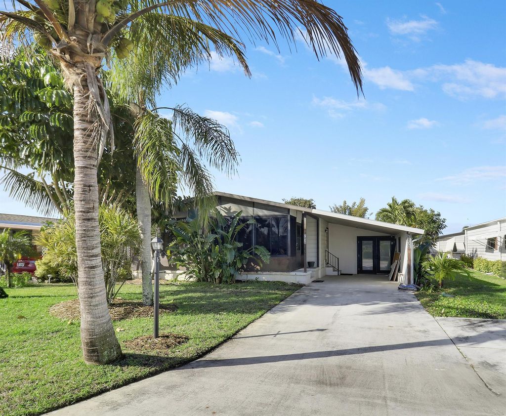 Photo of 7830 SE Shenandoah Drive, Hobe Sound, FL 33455 (MLS # R11062499)