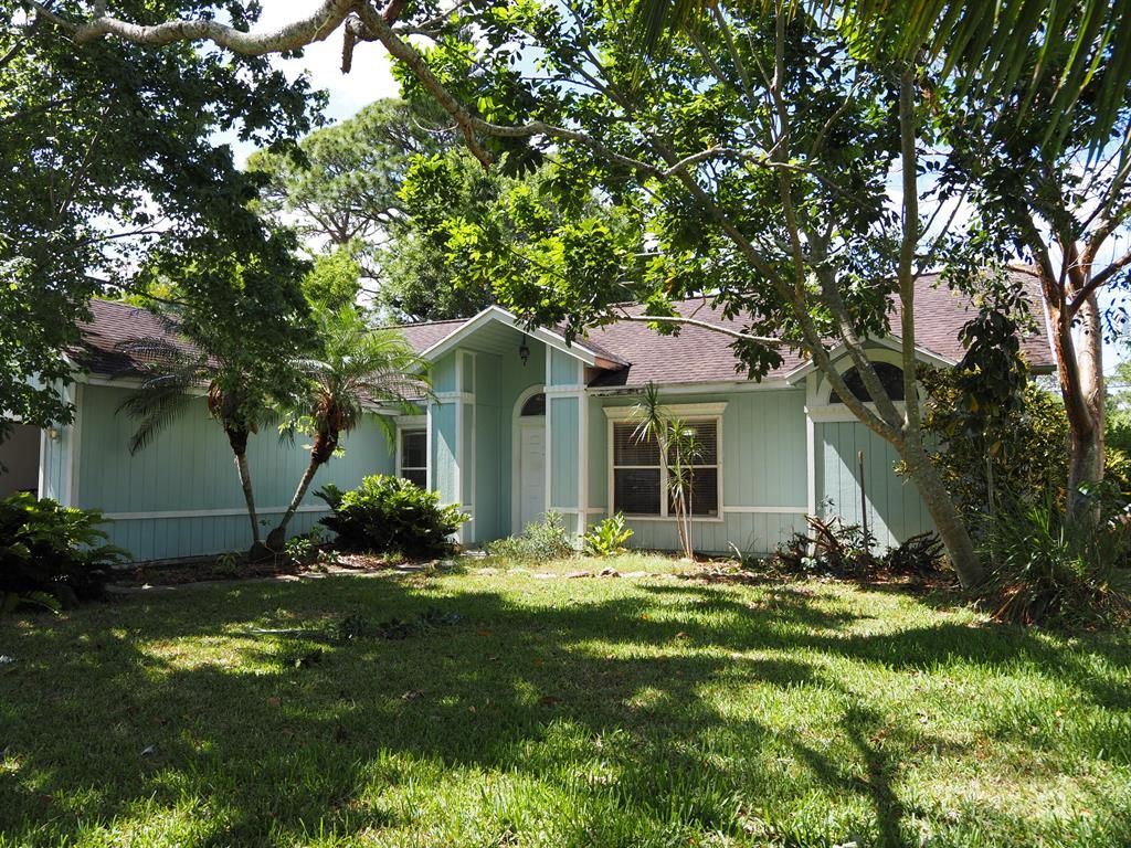 Photo of 1445 SW Sudder Avenue, Port Saint Lucie, FL 34953 (MLS # R10800103)