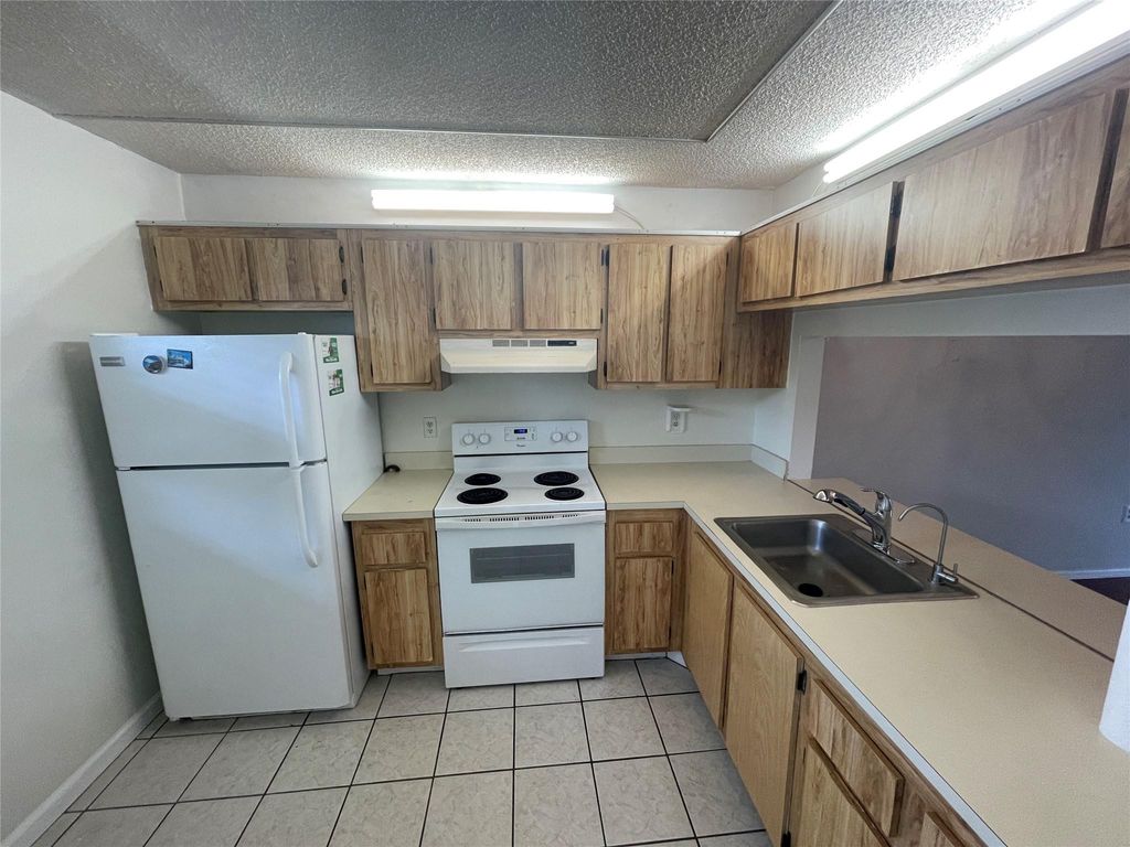 Photo of 143 NW 93rd Avenue #202, Pembroke Pines, FL 33024 (MLS # B26042123)