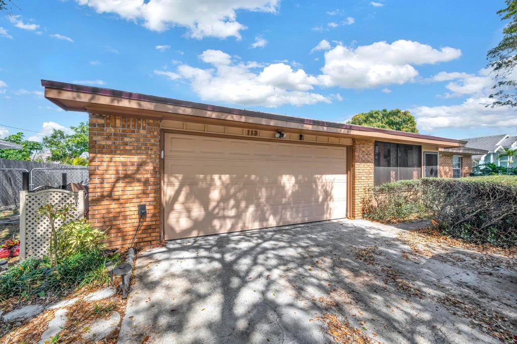 Photo of 113 SW Eyerly Avenue, Port Saint Lucie, FL 34983 (MLS # R10963018)
