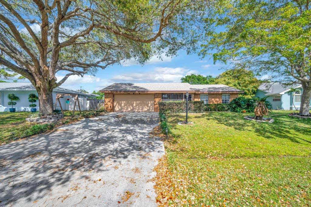 Photo of 113 SW Eyerly Avenue, Port Saint Lucie, FL 34983 (MLS # R10963018)