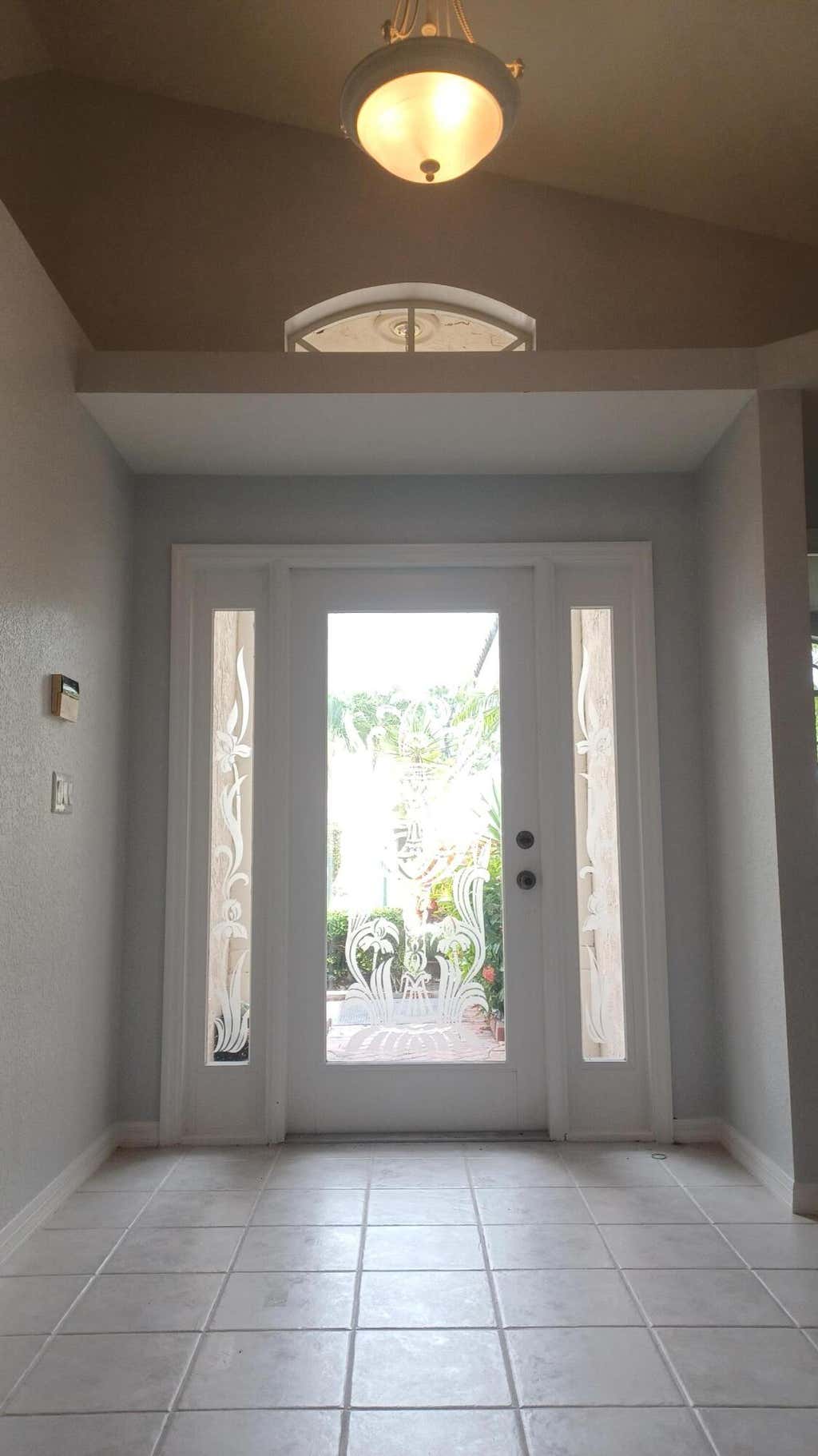 Photo of 12216 SE Plandome Drive, Hobe Sound, FL 33455 (MLS # R11018314)