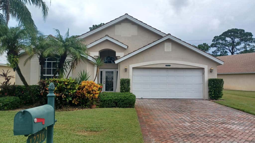 Photo of 12216 SE Plandome Drive, Hobe Sound, FL 33455 (MLS # R11018314)