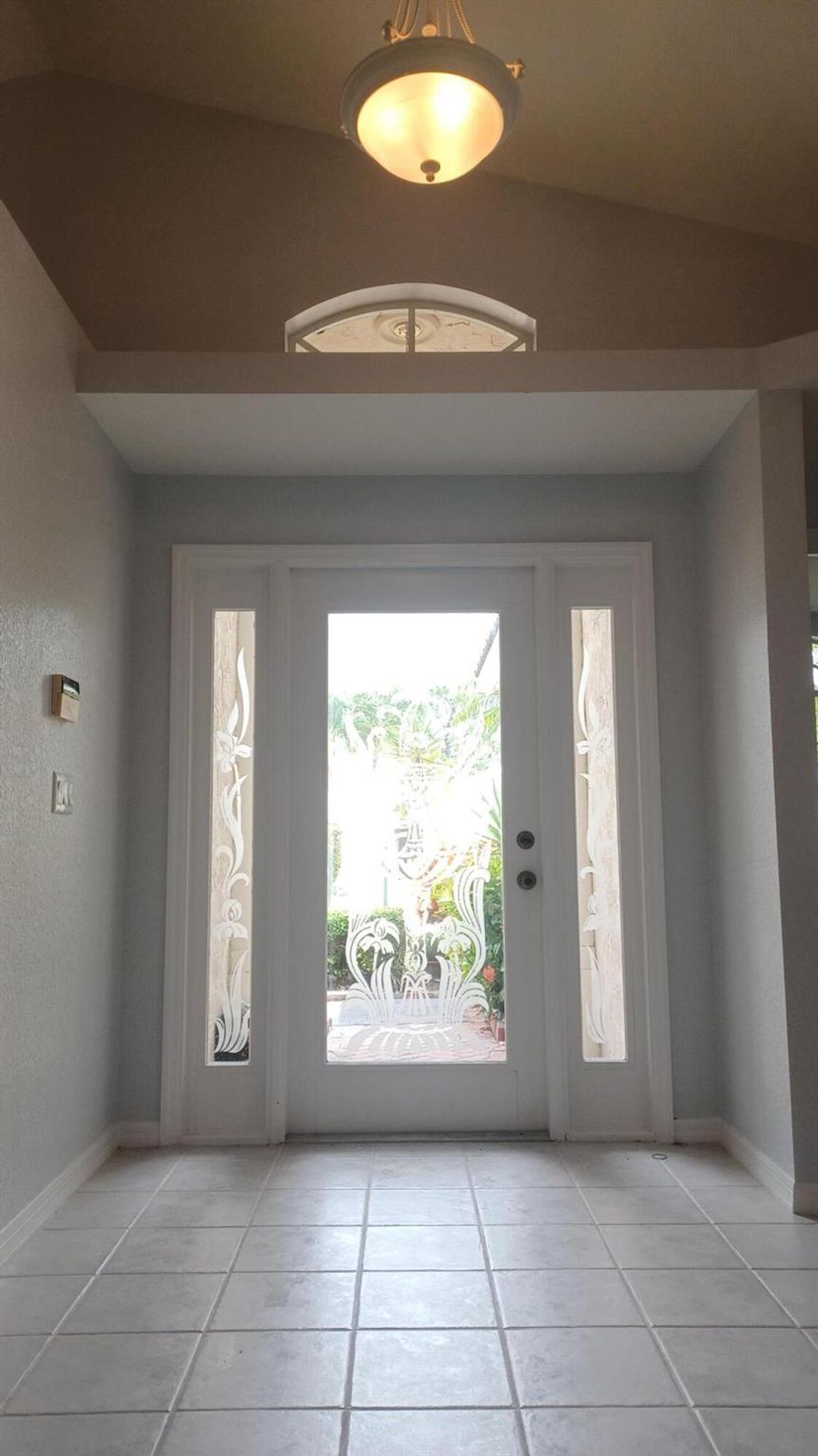 Photo of 12216 SE Plandome Drive, Hobe Sound, FL 33455 (MLS # R11018314)