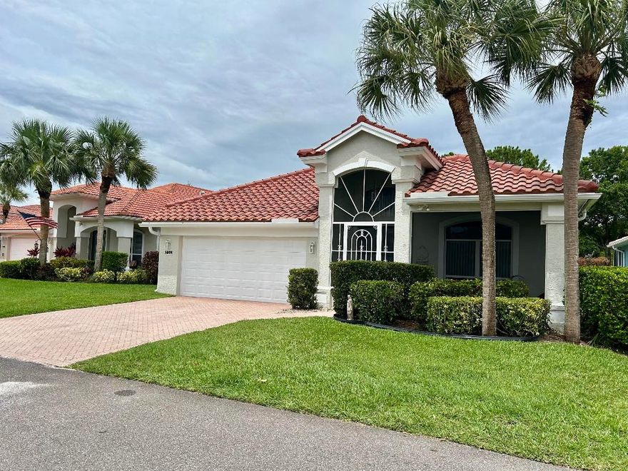 One of the best active adult Communities in Florida. This wonderful renovated 3/2/2 with a brand new roof. CERAMIC TILE WOOD LOOKING FLOORS. ENJOY sitting in your Family Room  with  the built in Electric Fire Place. PRICE TO SELL.