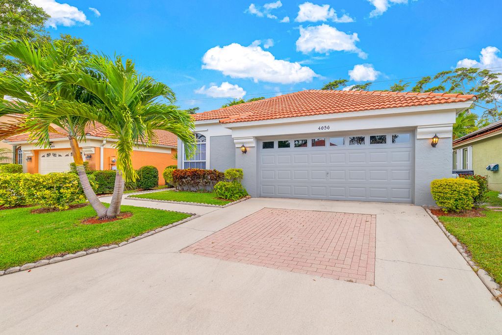 Photo of 4056 Dorado Drive, Riviera Beach, FL 33418 (MLS # R10801433)