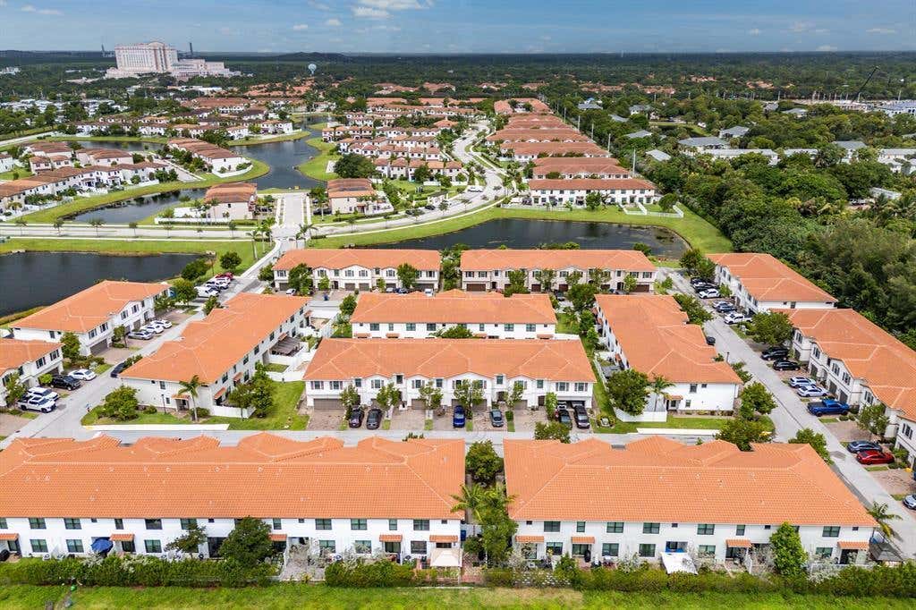 Photo of 4414 HEMLOCK Drive, Riviera Beach, FL 33410 (MLS # B26063429)