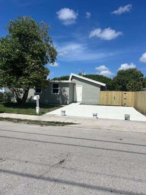 Photo of 310 NW 4th Avenue, Delray Beach, FL 33444 (MLS # B26068719)