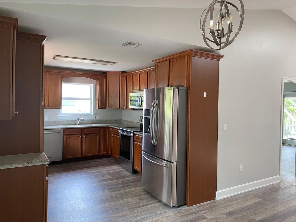Photo of 2014 SW Sunset Trail, Palm City, FL 34990 (MLS # B26042681)