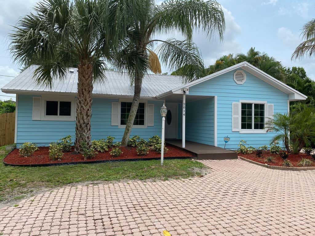 Photo of 2014 SW Sunset Trail, Palm City, FL 34990 (MLS # B26042681)