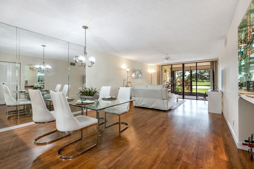 Exceptional opportunity in Gleneagles! This beautifully maintained FIRST-floor 2-bedroom, 2-bath residence offers tranquil golf course views from a screened patio, perfect for enjoying fresh air, morning coffee, and peaceful sunsets. The kitchen features wood cabinetry, stainless appliances, and laminate flooring updated in 2018, combining comfort and functionality. Major improvements include a newer A/C (2018), water heater (2025), and hurricane shutters in all windows for added peace of mind. The bathrooms are original and in good condition, and the home is thoughtfully priced to give buyers the opportunity to update and customize to their own taste. Bright, spacious, and full of potential—this is Florida country club living at its best. MANDATORY MEMBERSHIP COMMUNITY Gleneagles is all-ages private, residential community with 1,082 homes and condominiums surrounding world-class social and sports amenities, including two 18-hole championship golf courses, 19 tennis courts, 8 Pickleball courts, 3 restaurants, 2 lounges, State of the Art Fitness center and SPA.