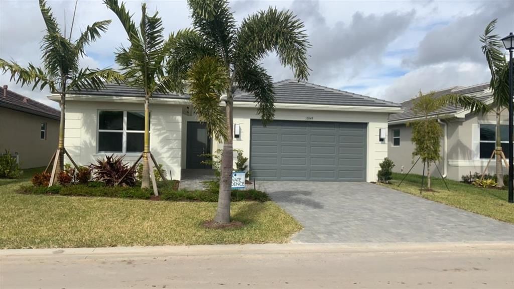 Photo of 13049 SW Brook View Terrace, Port Saint Lucie, FL 34987 (MLS # R10787957)