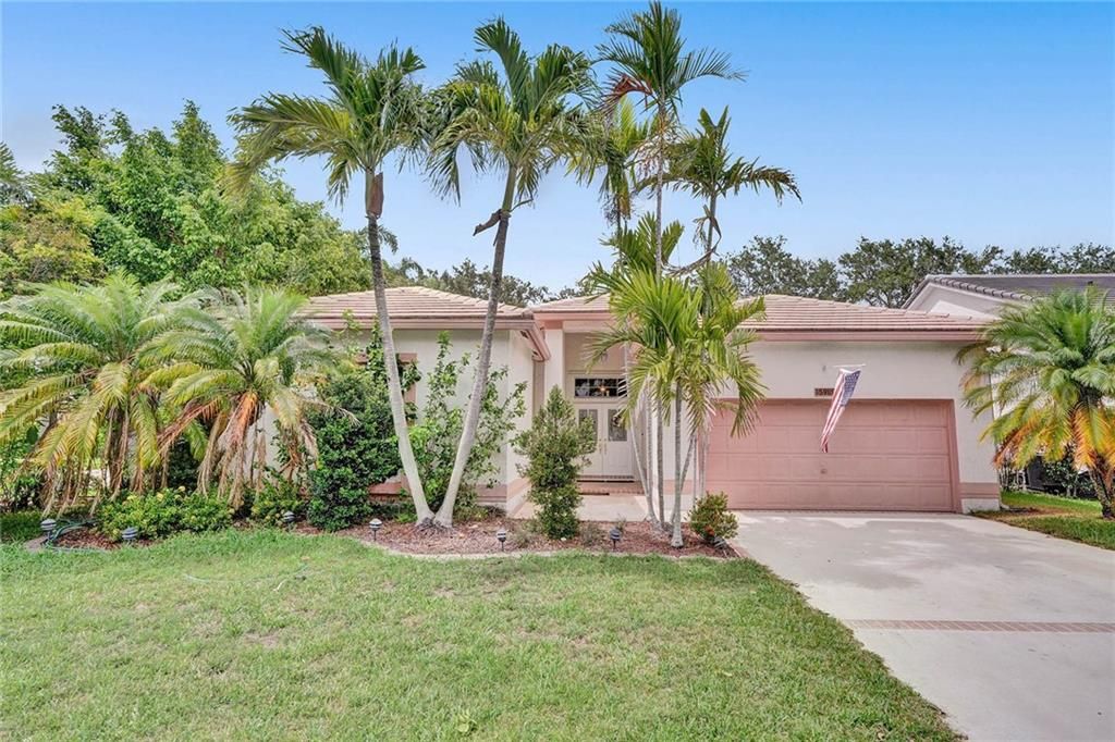 Photo of 5989 NW 74 Street, Parkland, FL 33067 (MLS # F10287380)