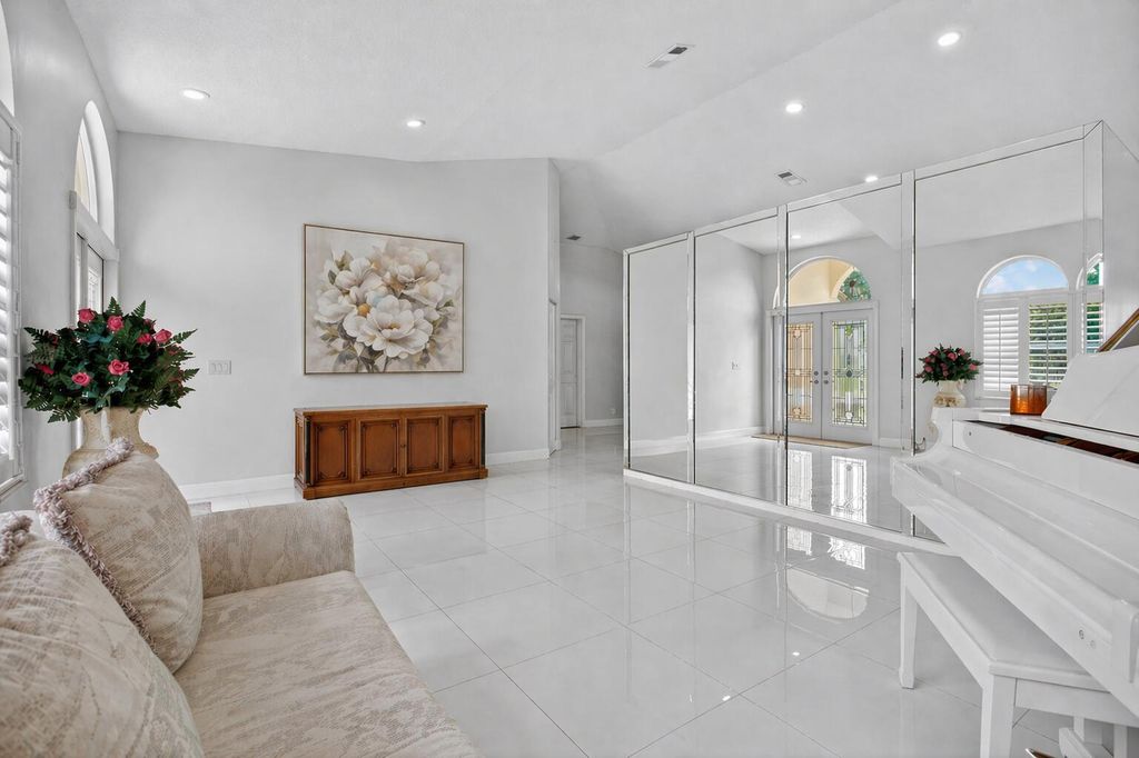 Photo of 5670 NW 38th Terrace, Coconut Creek, FL 33073 (MLS # B26019202)