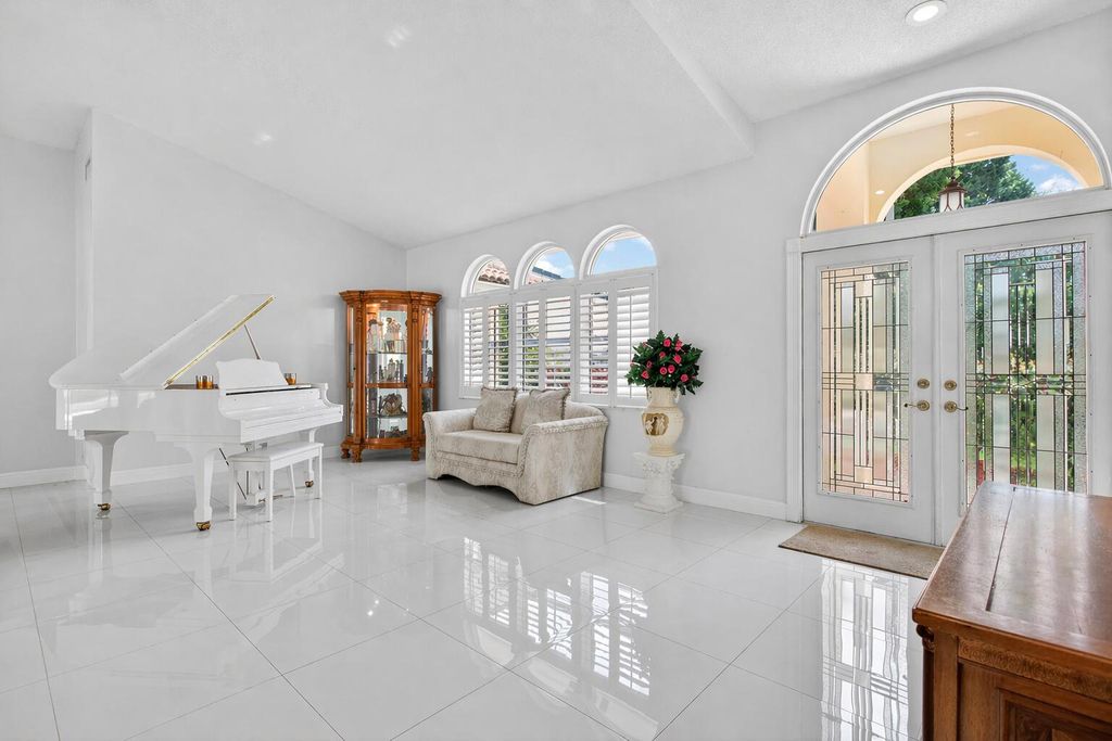 Photo of 5670 NW 38th Terrace, Coconut Creek, FL 33073 (MLS # B26019202)